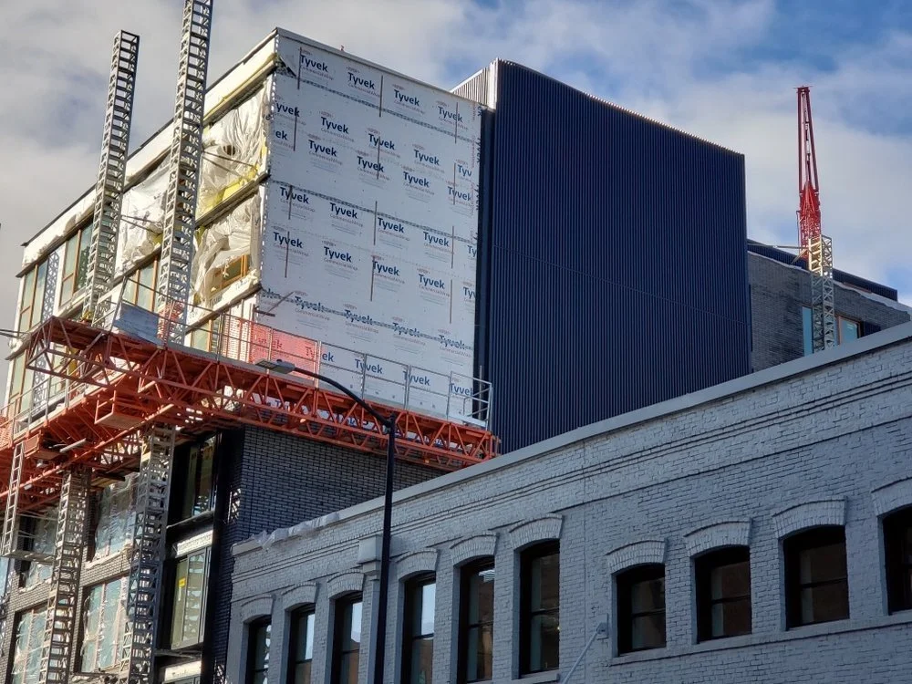 Pearl Apartments scaffold brick wall installation
